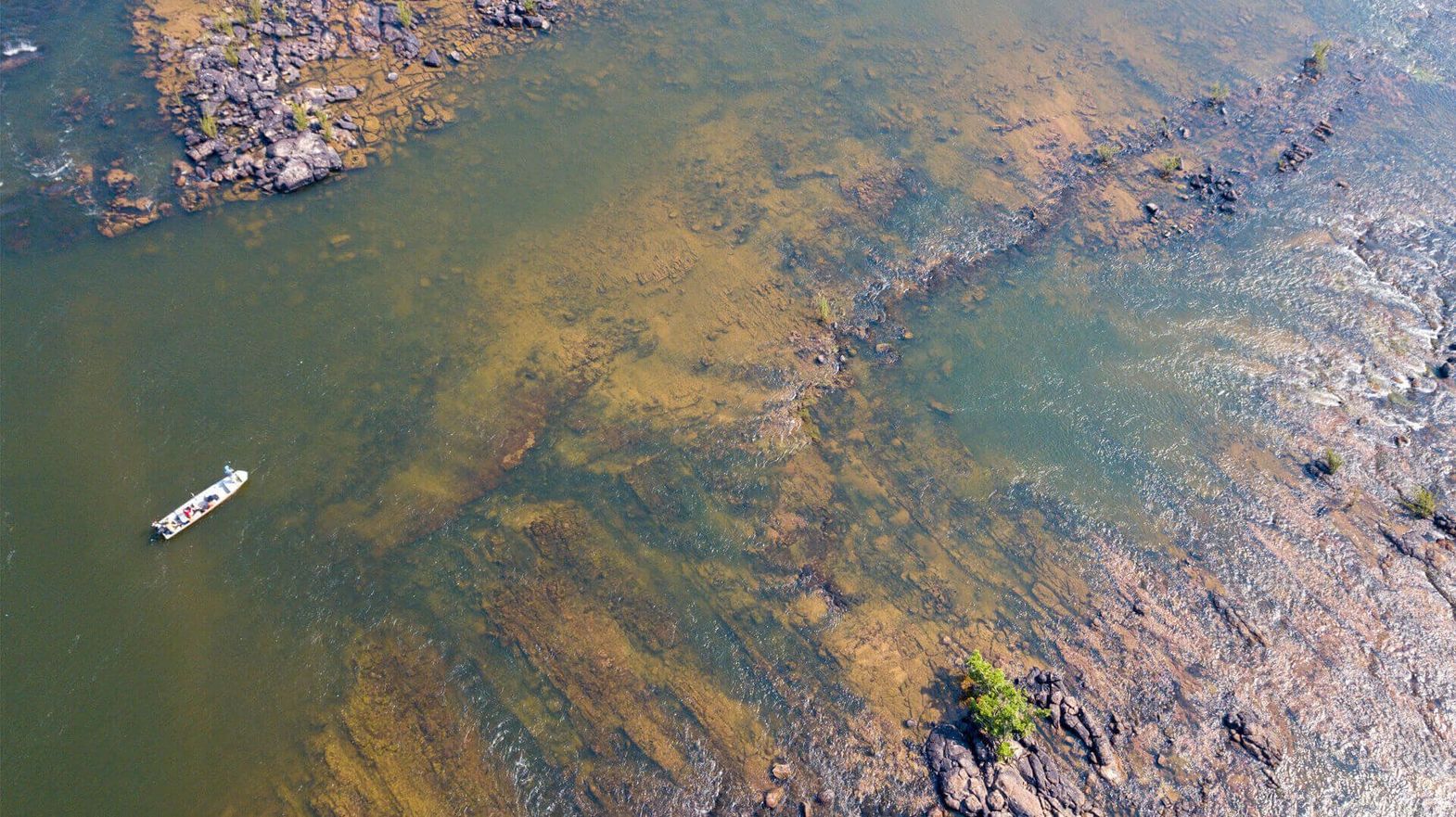Sandbanks showing in the river in the dry season, from the air